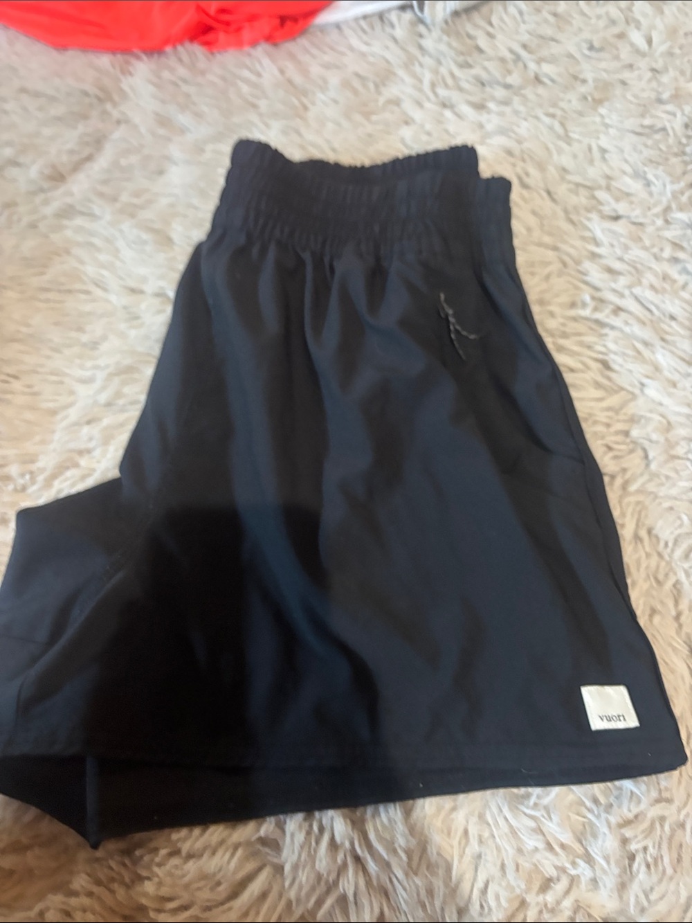 Vuori Black woman’s athletic shirts dry fit